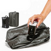 Mini pompe électrique aspirant l'air d'un sac de compression pour vêtements