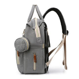Sac à langer transformable en lit couffin vert vue de face – Sac à Langer Transformable en Lit Couffin | Sogaïa
