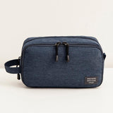 Travel toiletry bag for men gray front view – Lightweight Men's Travel Toiletry Bag | Sogaïa