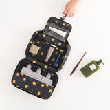 Trousse de toilette pliable gris vue de face – Trousse de Toilette Pliable Travel™ | Sogaïa