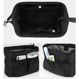 Large opening black toiletry bag front view – Large opening toiletry bag | Sogaïa
