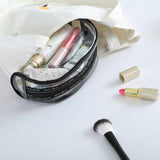 Trousse de voyage transparente rose vue de face – Trousse de Voyage Transparente | Sogaïa