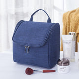 Hanging toiletry bag for women in navy blue, front view – Hanging toiletry bag for women | Sogaïa