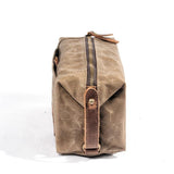 Vintage brown toiletry bag front view – Vintage Toiletry Bag | Sogaïa