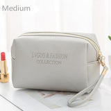 Trousse de toilette femme chic orange vue de face – Trousse de Toilette Souple Chic LVGUO et FASHION™ | Sogaïa